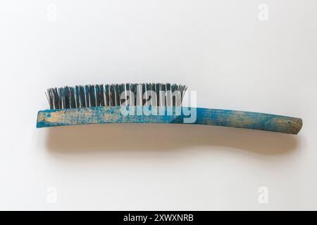 wire brush used for a wide range of tasks, including cleaning, surface preparation, and restoration isolated on white background Stock Photo