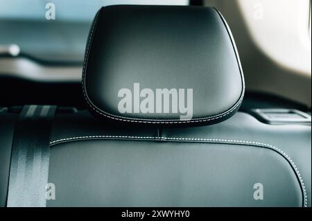 LEATHER TEXTURE of a seat in an expensive new car. High quality photo Stock Photo