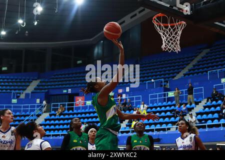 Mexico City, Ciudad de Mexico, Mexico. 20th Aug, 2024. Diana Balayera #77 of Mali drives to the basket during the match against Team Venezuela as part of the Mexico 2024 FIBA Women's Basketball World Cup Pre-Qualifying Tournament. At the Juan de la Barrera Olympic Gymnasium. Mali defeat Venezuela 88-66. on August 20, 2024 in Mexico City, Mexico. (Credit Image: © Carlos Santiago/eyepix via ZUMA Press Wire) EDITORIAL USAGE ONLY! Not for Commercial USAGE! Stock Photo