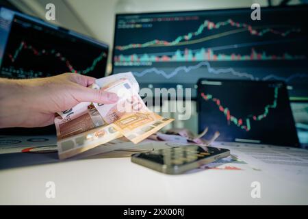 Economy euro currency banknote Exchange. Stock charts displays. Office space interior. Stock Photo