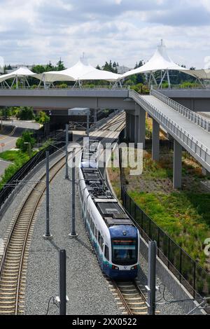 Redmond, WA, USA - August 14, 2024; Seattle Link Light Rail train on 2 Line at Redmond Technology alongside Microsoft campus Stock Photo