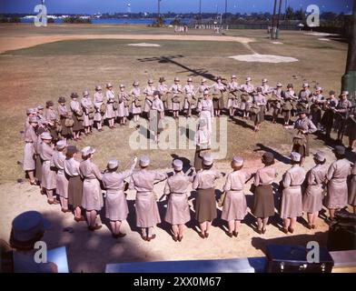 World War II. WAAC's (Women's Army Auxiliary Corps) in Training. 1940s The Women's Army Corps (WAC) was the women's branch of the United States Army. It was created as an auxiliary unit, the Women's Army Auxiliary Corps (WAAC) on 15 May 1942, and converted to an active duty status in the Army of the United States as the WAC on 1 July 1943. Its first director was Colonel Oveta Culp Hobby. The WAC was disbanded in 20 October 1978, and all units were integrated with male units. Stock Photo