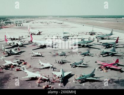 Cold War era. Representing the might of the U.S. Air Force, this static display on the flight line at a recent firepower demonstration contains almost all of the U.S. Air Force's operational aircraft, counter-clockwise, the aircraft are (top center) B-36, B-52, KC-135, B-47, B-66, B-57, F-100, F-102, RF-101, F-89, HU-16, C-130, KB-50, C-124, in the inner circle are (upper left) RC-121, F-94, F-86D, T-37, F-86D, T-37, F-86H, F-84, and KC-97 during the U.S. Air Force Miniature.' Eglin Air Force Base, Florida. 1957 Stock Photo