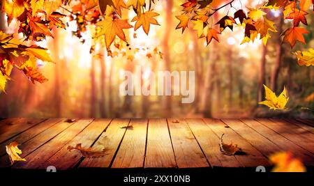 Autumn Wooden Table - Fall In Orange Forest At Sunset Stock Photo
