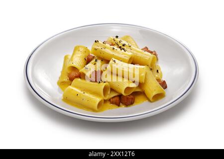 rigatoni alla carbonara, Roman pasta dish isolated on white background Stock Photo