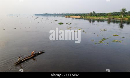 Aerial of a dugout canoe on the Congo River, Mbandaka, Equateur province, Democratic Republic of Congo, Africa Stock Photo