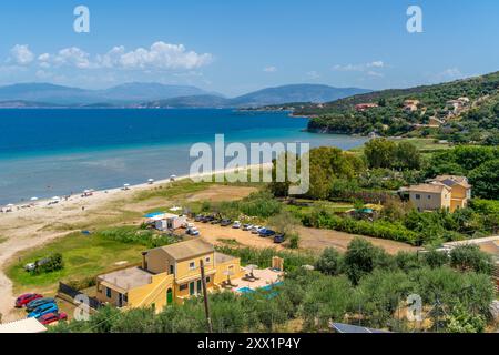 View of beach at Paralia Kalamaki and Albanian coast in background, Paralia Kalamaki, Corfu, Ionian Sea, Greek Islands, Greece, Europe Stock Photo