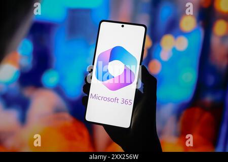 In this photo illustration, the Microsoft 365 logo is displayed on a smartphone screen. Stock Photo