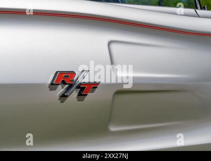 DEARBORN, MI/USA - JUNE 15, 2024: Close-up of a 1967 Dodge Coronet R/T emblem, The Henry Ford (THF) Motor Muster car show, Greenfield Village Stock Photo