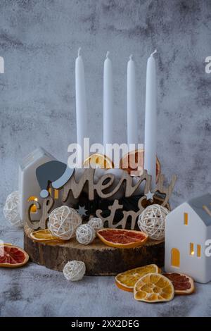 Four Advent candles calendar with Christmas zero waste decorations. Holiday preparation copy space for text. Catholic traditions of Christmas countdown new year winter holidays  Stock Photo