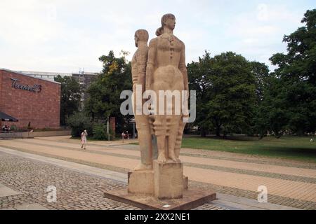 Sculptural composition Dignity, Beauty and Pride of Man in Socialism, installed in 1974, at Stadthallenpark, Chemnitz, Germany Stock Photo