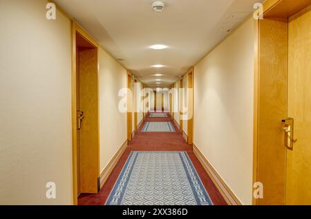 Long corridor in hotel Stock Photo