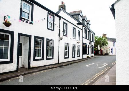 Black and white cottages and houses on the High Street in village of Moniaive in the Parish of Glencairn Dumfries and Galloway Scotland United Kingdom Stock Photo