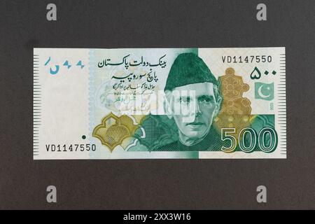 Pakistani 500 Rupees Green Color Banknote Feathering Quaid-e-Azam Muhammad Ali Jinnah Portrait Stock Photo