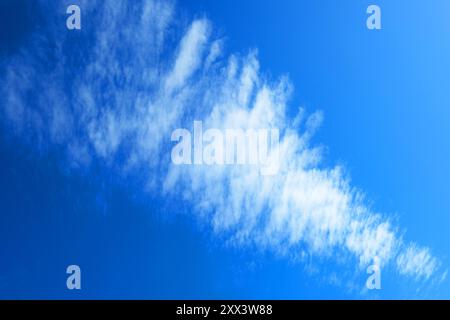 Wispy dreamlike cirrus clouds high in the atmosphere - John Gollop Stock Photo