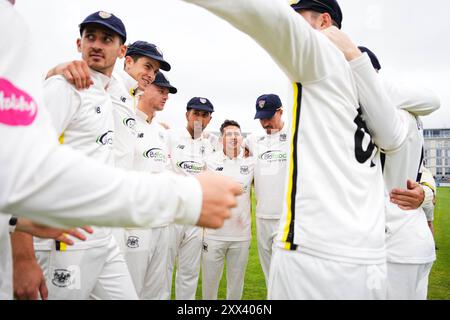 Bristol, UK, 22 August 2024. Gloucestershire huddle during the Vitality County Championship Division Two match between Gloucestershire and Leicestershire. Credit: Robbie Stephenson/Gloucestershire Cricket/Alamy Live News Stock Photo