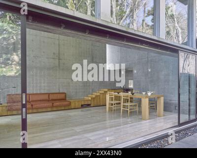 Concrete walls in a contemporary living room loft in a luxury house in Japan Stock Photo