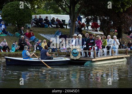 A procession of decorated boats and barges form a floating parade along the Royal Military Canal in Hythe Kent, UK, 21st August 2024. Stock Photo