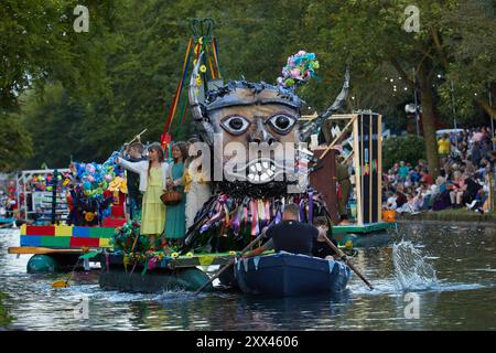 A procession of decorated boats and barges form a floating parade along the Royal Military Canal in Hythe Kent, UK, 21st August 2024. Stock Photo