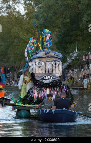 A procession of decorated boats and barges form a floating parade along the Royal Military Canal in Hythe Kent, UK, 21st August 2024. Stock Photo