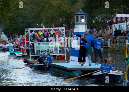 A procession of decorated boats and barges form a floating parade along the Royal Military Canal in Hythe Kent, UK, 21st August 2024. Stock Photo