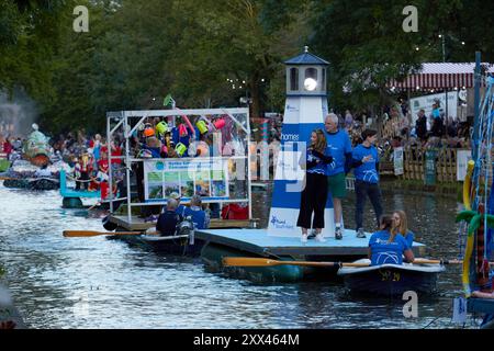 A procession of decorated boats and barges form a floating parade along the Royal Military Canal in Hythe Kent, UK, 21st August 2024. Stock Photo