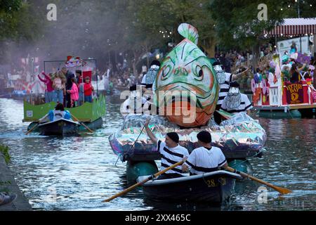 A procession of decorated boats and barges form a floating parade along the Royal Military Canal in Hythe Kent, UK, 21st August 2024. Stock Photo