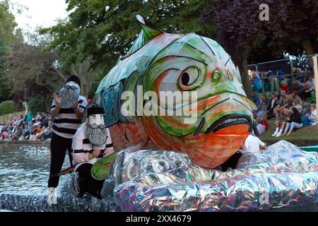 A procession of decorated boats and barges form a floating parade along the Royal Military Canal in Hythe Kent, UK, 21st August 2024. Stock Photo