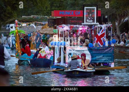 A procession of decorated boats and barges form a floating parade along the Royal Military Canal in Hythe Kent, UK, 21st August 2024. Stock Photo