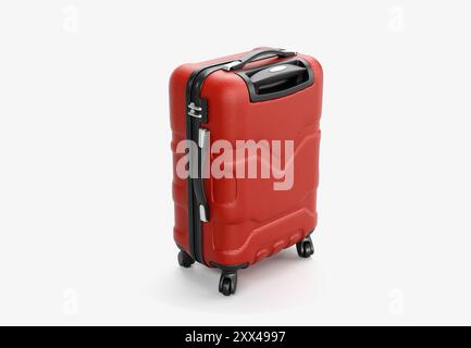 A regular red plastic travel luggage suitcase with a zipper handles and a combination lock on an isolated white background - 3D render Stock Photo