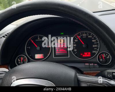 speedometer and other instruments on the dashboard of the car Stock Photo