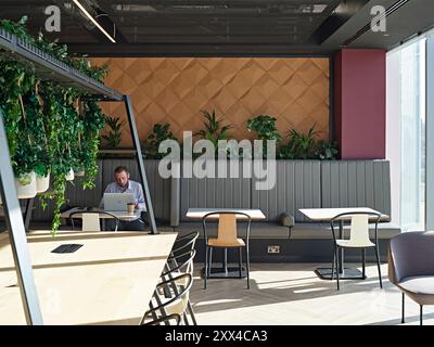 Cafe interior. Building 1180, Reading, United Kingdom. Architect: Spratley +  Partners, 2022. Stock Photo