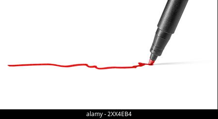 Art and craft theme showing a felt pen tip and a line of red dye on white paper ground Stock Photo