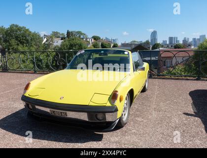 Yellow Porsche 914 2.0 car at the Old Timer Rally at  Mont Valerien, Suresnes, Paris, France. Stock Photo