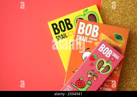 KYIV, UKRAINE - AUGUST 17, 2024 Bob snail candies packs with original logo close up Stock Photo