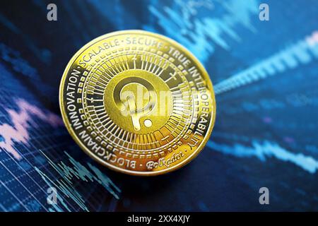 KYIV, UKRAINE - AUGUST 17, 2024 PolkaDot coin on abstract fictional cryptocurrency trading chart in blue color close up Stock Photo