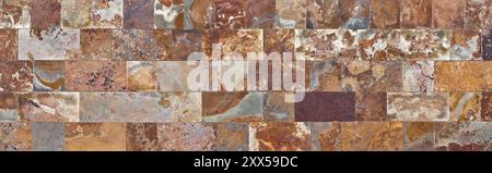 Wall cladding made of rectangular stone slabs with different abstract patterns Stock Photo