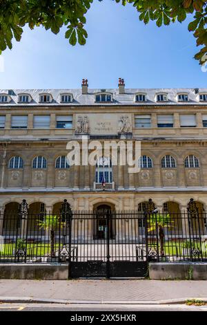 Facade of the building housing the Faculty of Pharmacy of Paris, France, attached to the Faculty of Health of the Paris-Cité University Stock Photo