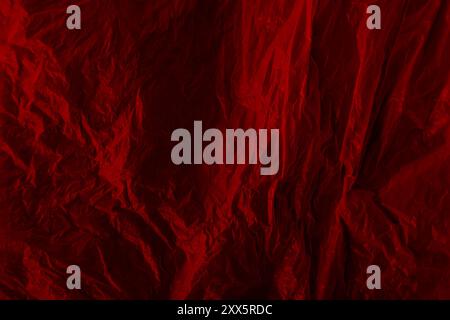 Close-up of wrinkled red plastic background Stock Photo