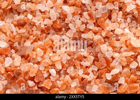 Pure salt in fine grains and coarse grains - Himalayan pink crystals Stock Photo