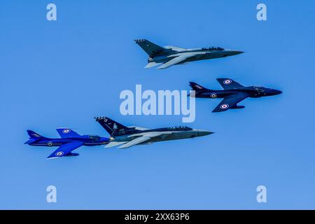 2 Hunters with 2 RAF Tornado fighters in formation at Kemble Airshow Stock Photo