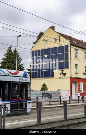 Residential building in Herne, vertical photovoltaic modules were installed at the top of the building, optimal utilisation of space on houses, North Stock Photo