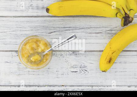 Mashed Bananas on a vintage background as detailed close-up shot (selective focus) Stock Photo