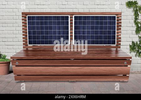 Smart Bench, charging station via solar panels for mobile phones and iPads Stock Photo