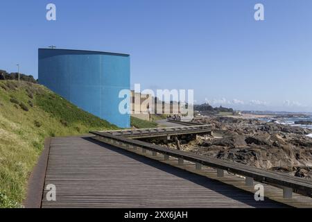 Passadico das Ondas boardwalk, rocks and surf on the beach promenade in Nevogilde, Norte region, Porto district, Portugal, Europe Stock Photo