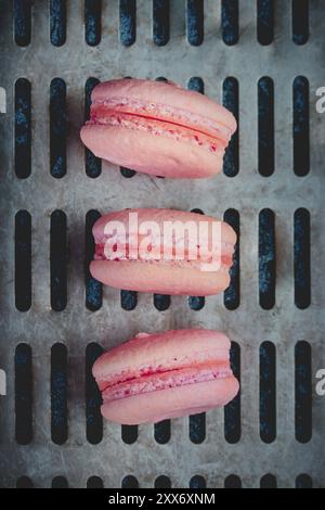 Sweet pink french macaroons close up Stock Photo