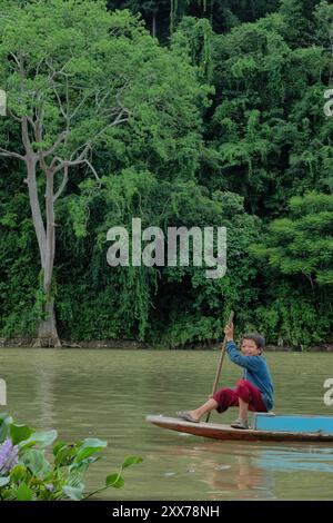 Boy on the Nam Ou River, Muang Khua, Laos Stock Photo