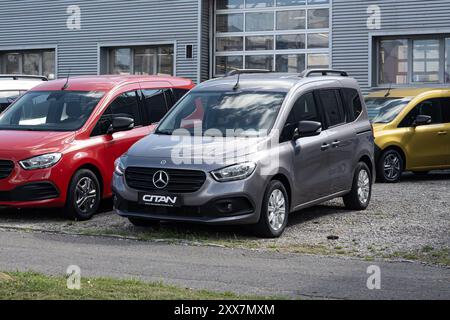 OSTRAVA, CZECH REPUBLIC - SEPTEMBER 21, 2023: Grey and red Mercedes-Benz Citan commercial vehicles presented at dealership Stock Photo