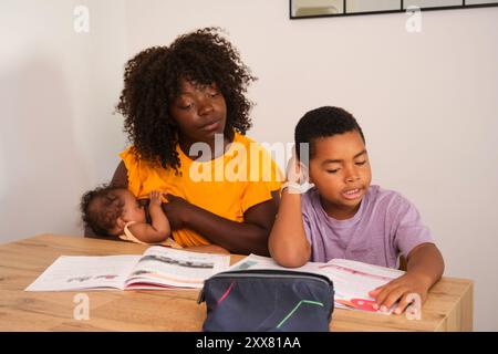 Nude mother breastfeeding infant son Stock Photo - Alamy