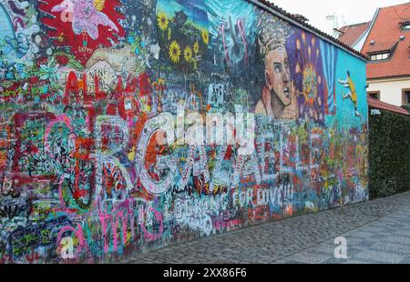 Lennon Wall in Prague a symbol of freedom, revolution and peace. Stock Photo